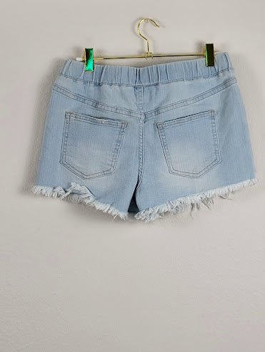 Pantalones cortos de mezclilla desgastados con lavado claro