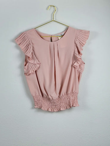 Blusa rosa con volantes