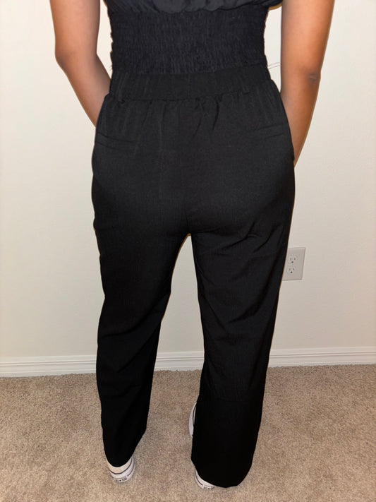 PANTALONES DE TIRO ALTO CON ESPALDA ELÁSTICA Y PIERNA ANCHA